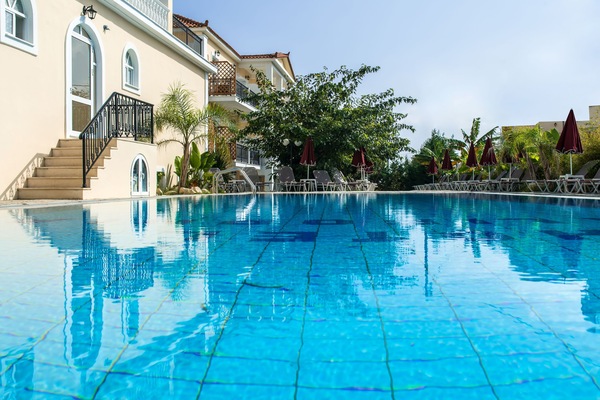 Seasonal outdoor pool, open 10:30 AM to 6:30 PM, pool umbrellas