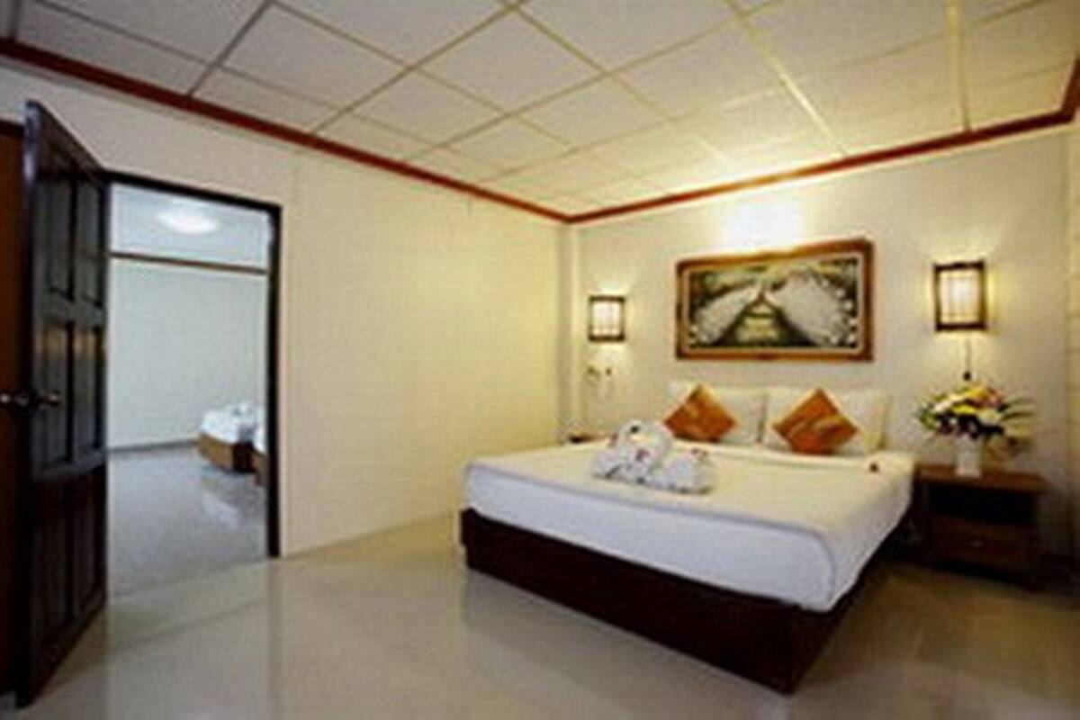 Quadruple Room | Minibar (some free items), in-room safe, WiFi (free)