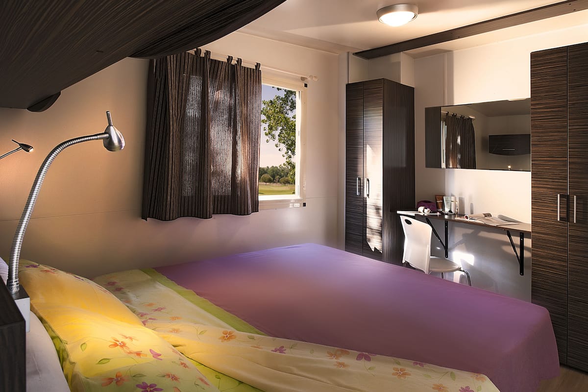 Blackout curtains, iron/ironing board (on request), cots/infant beds