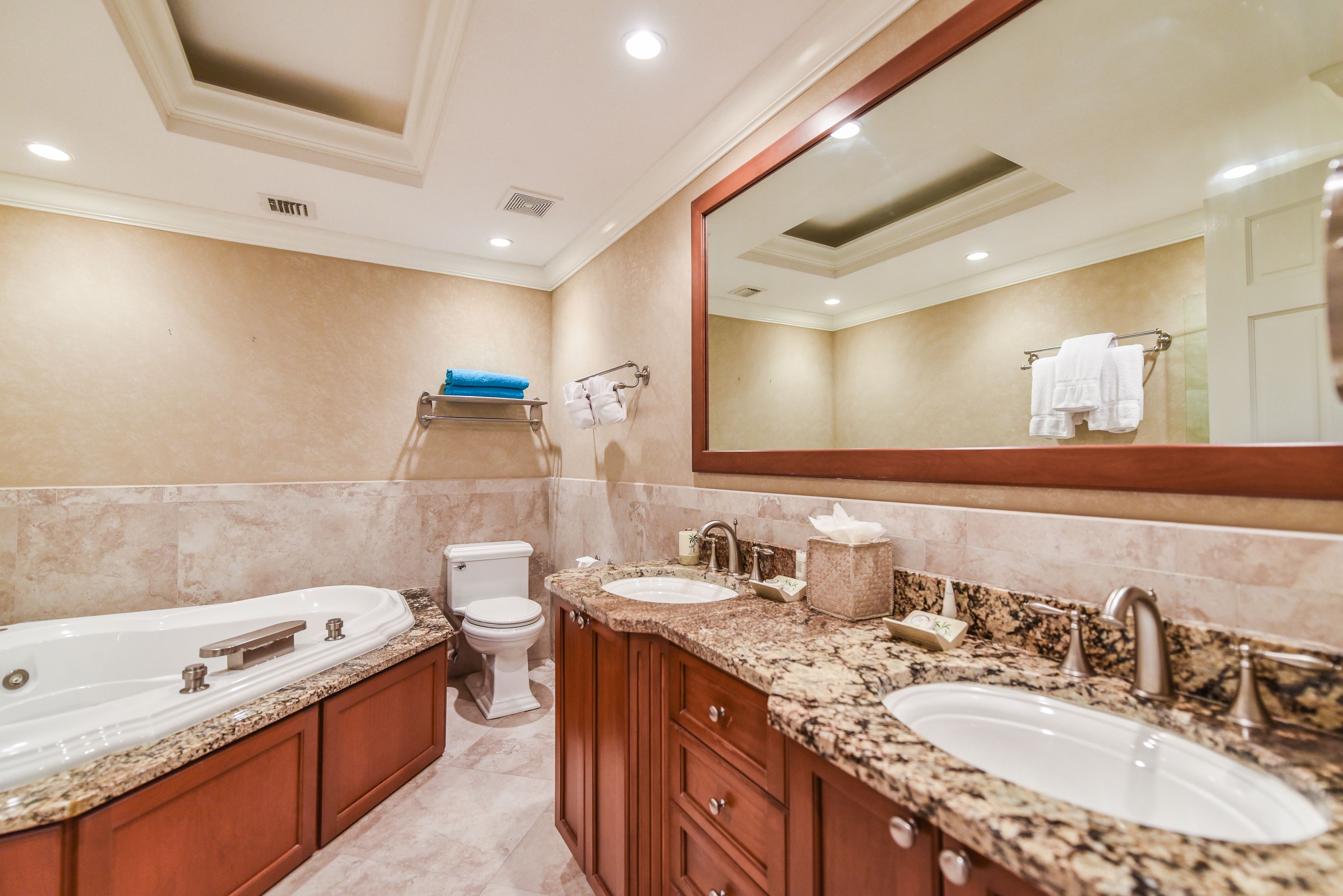 separate bathtub and shower, designer toiletries, hair dryer, towels