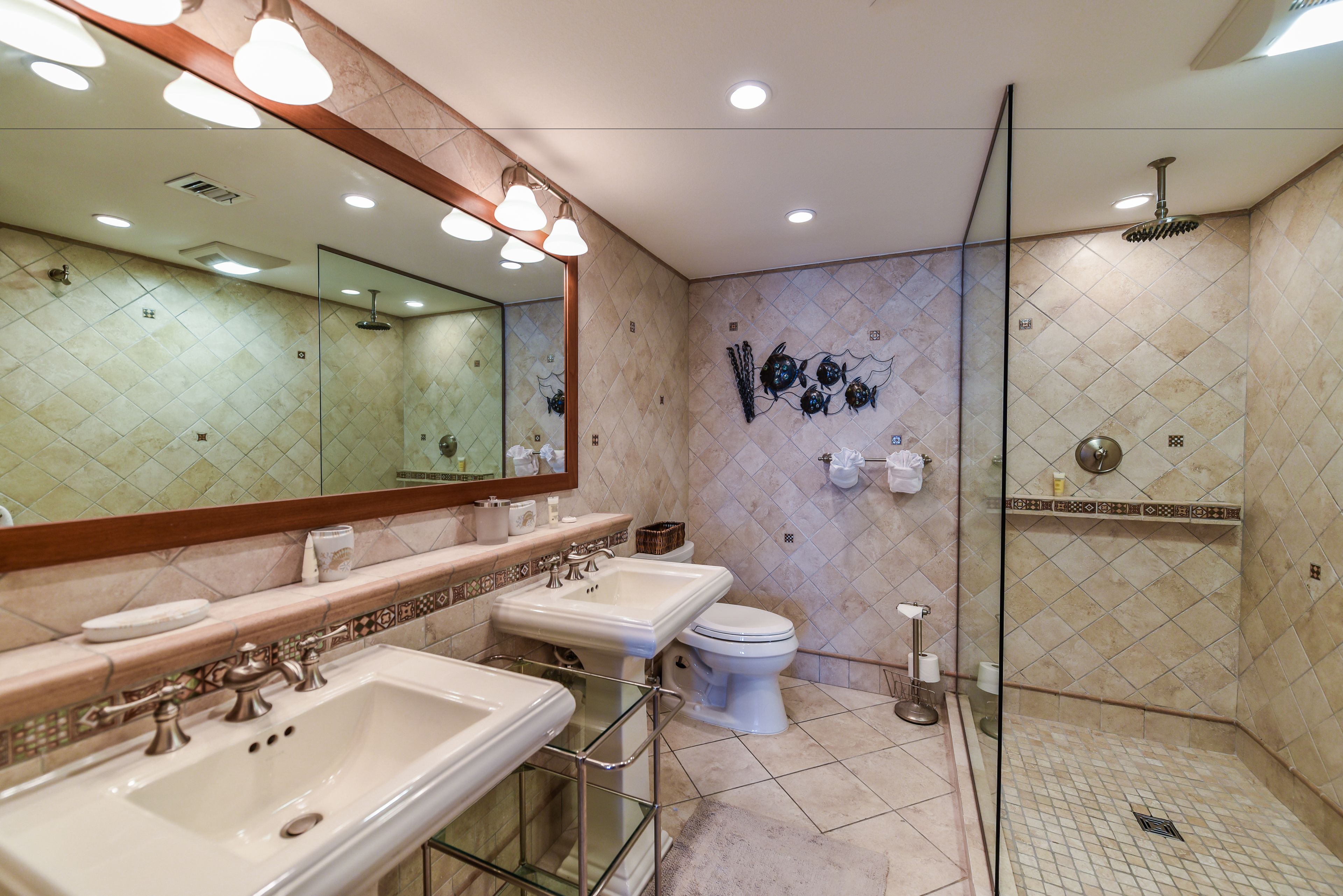 separate bathtub and shower, designer toiletries, hair dryer, towels