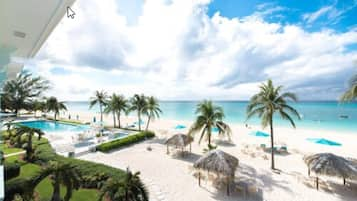 Private beach, white sand, sun loungers, beach umbrellas