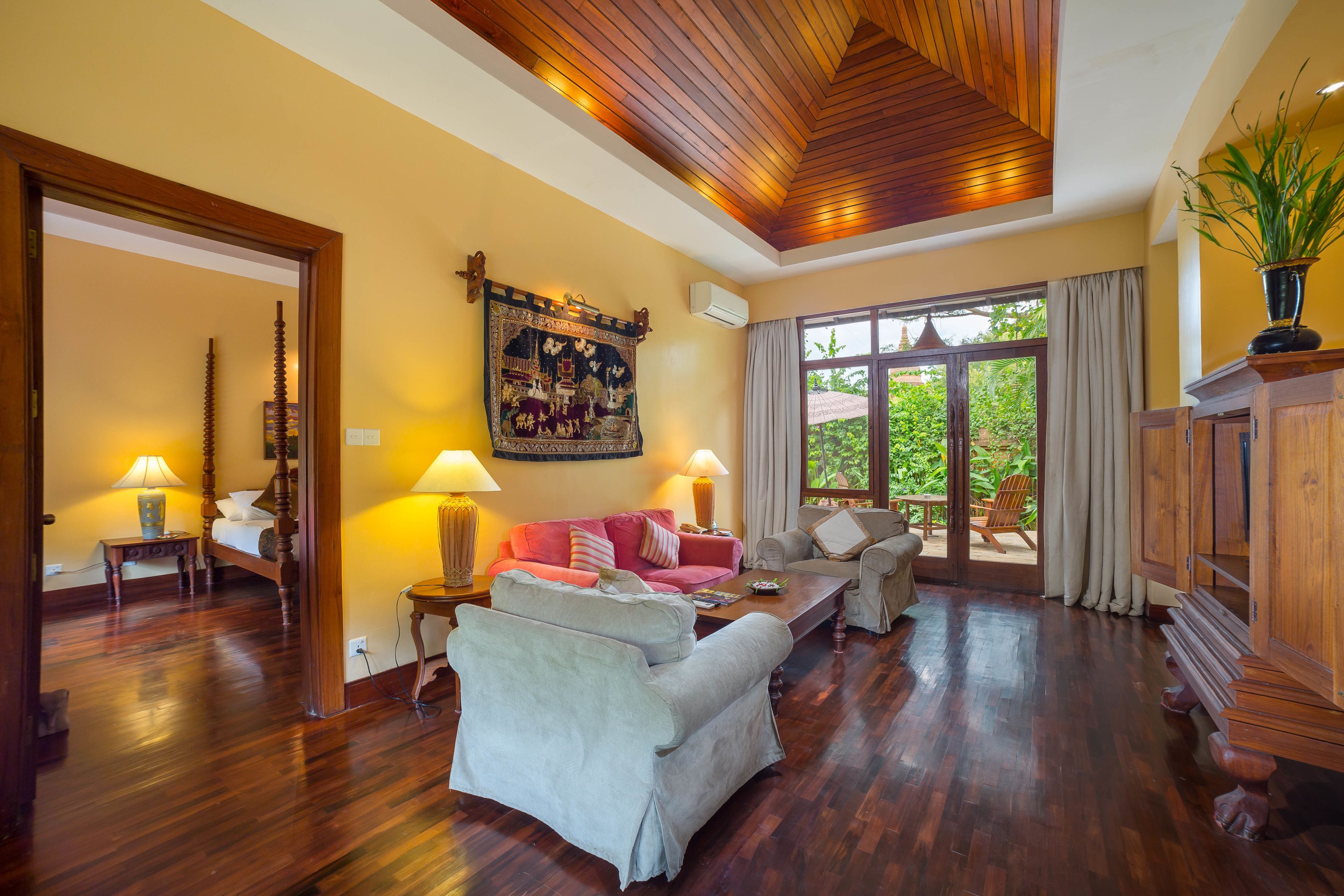 luxury suite, 1 bedroom, kitchenette, garden area | living room | 32-inch flat-screen tv with satellite channels, tv