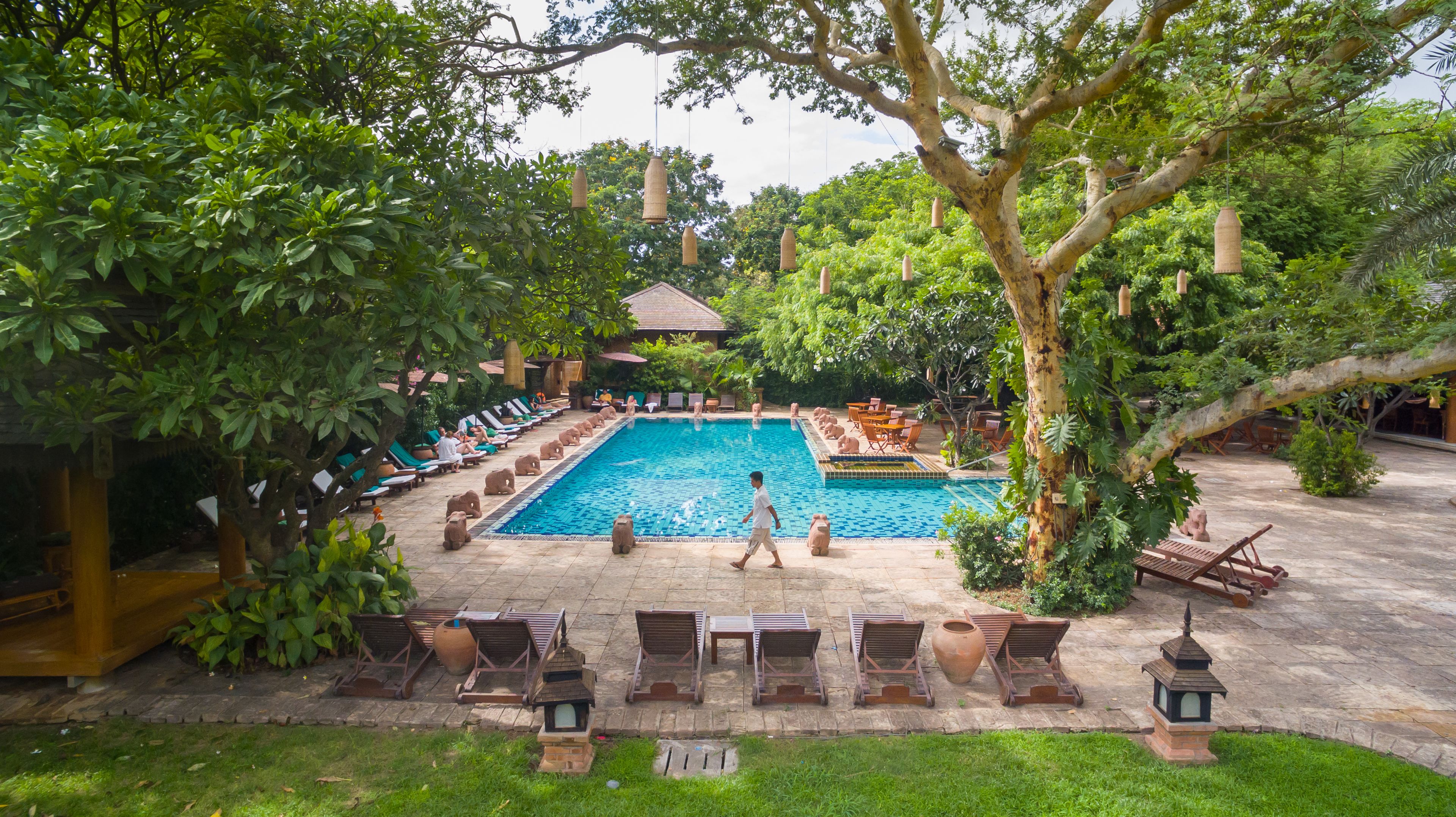 outdoor pool, pool umbrellas, pool loungers