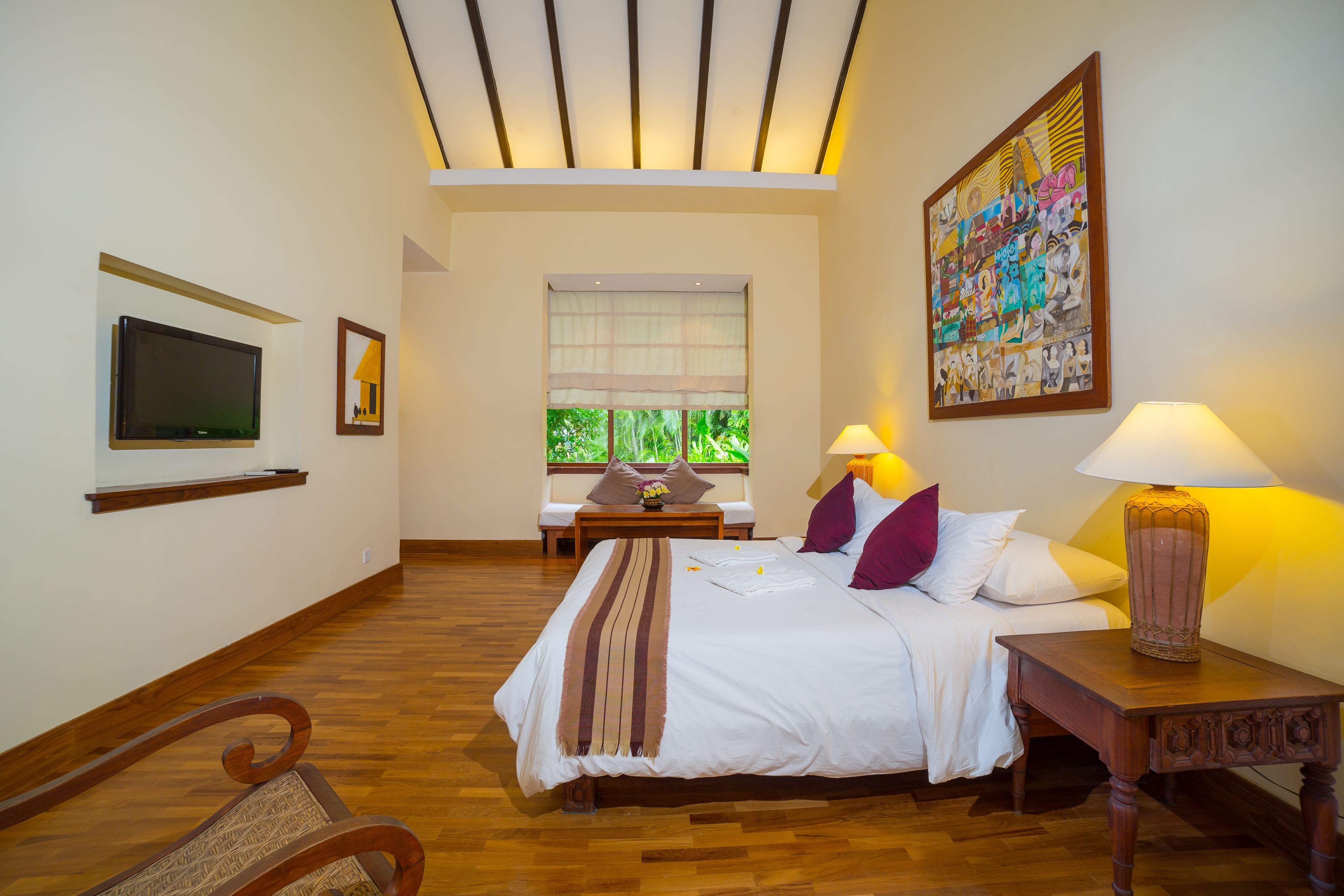 deluxe room | minibar, in-room safe, desk, laptop workspace