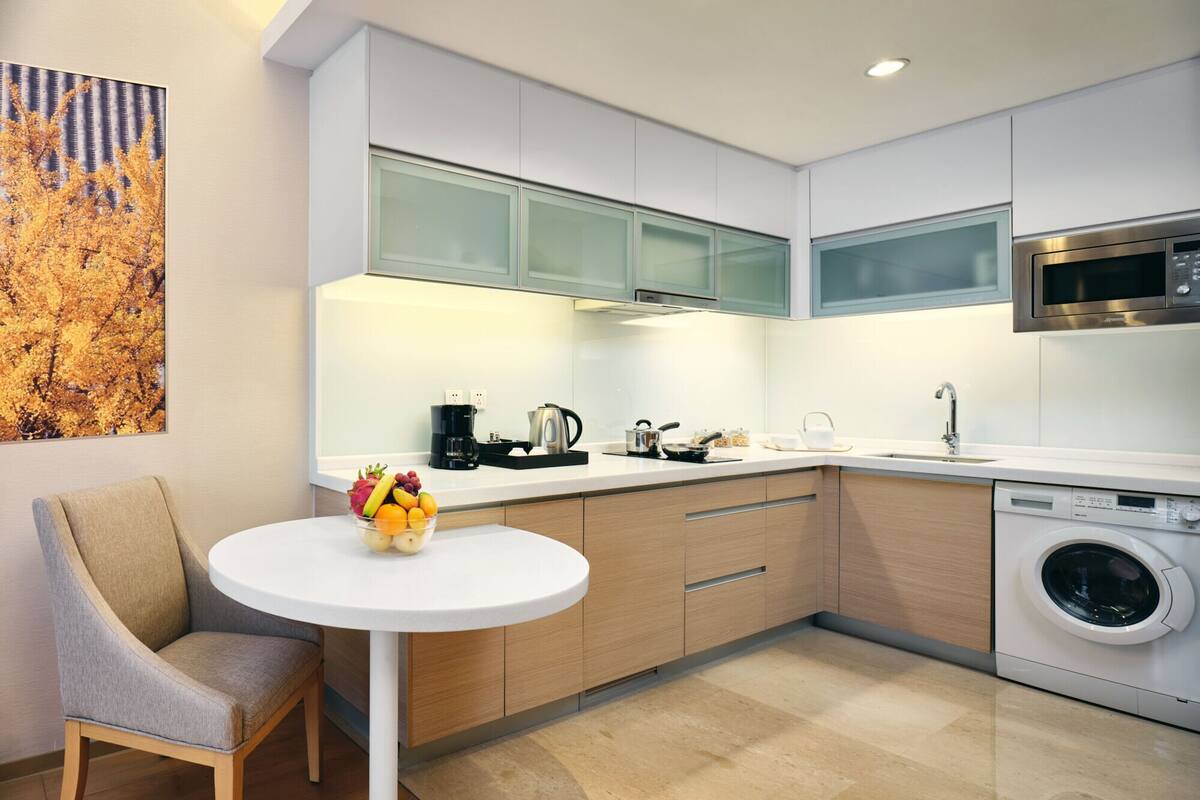 full-sized fridge, microwave, stovetop, coffee/tea maker