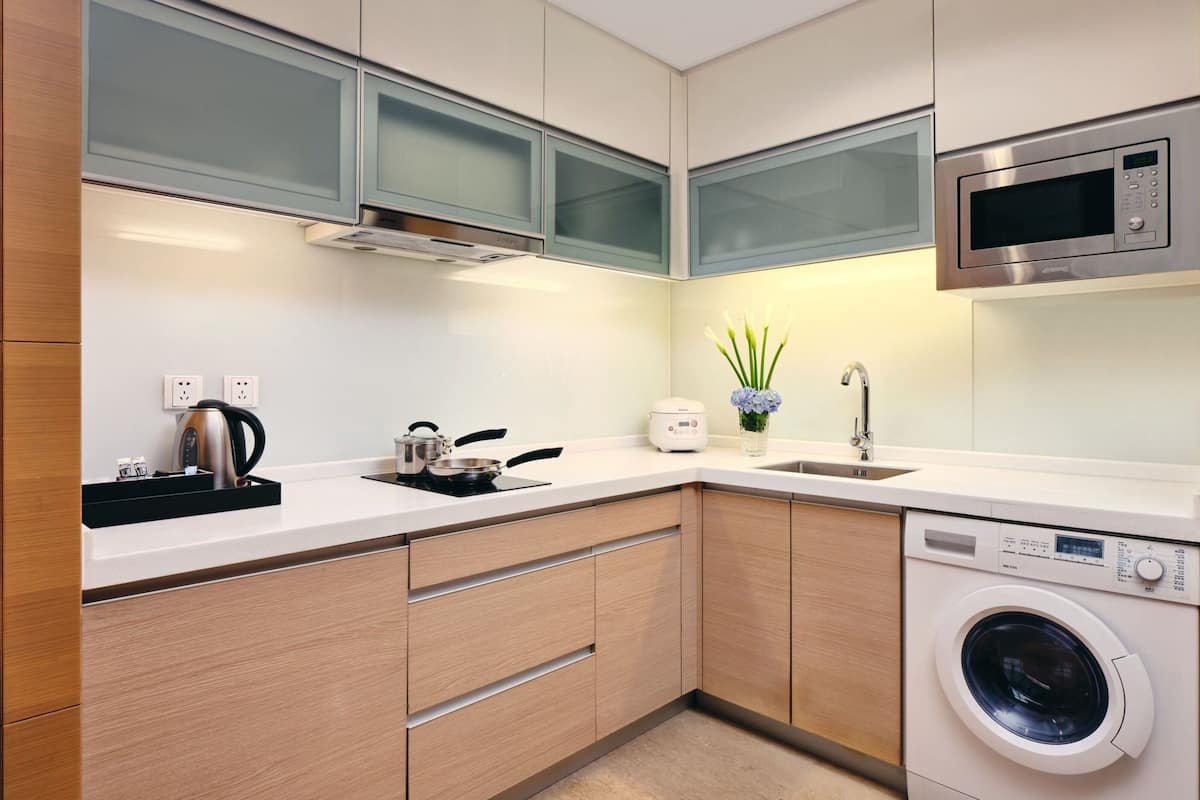 full-sized fridge, microwave, stovetop, coffee/tea maker