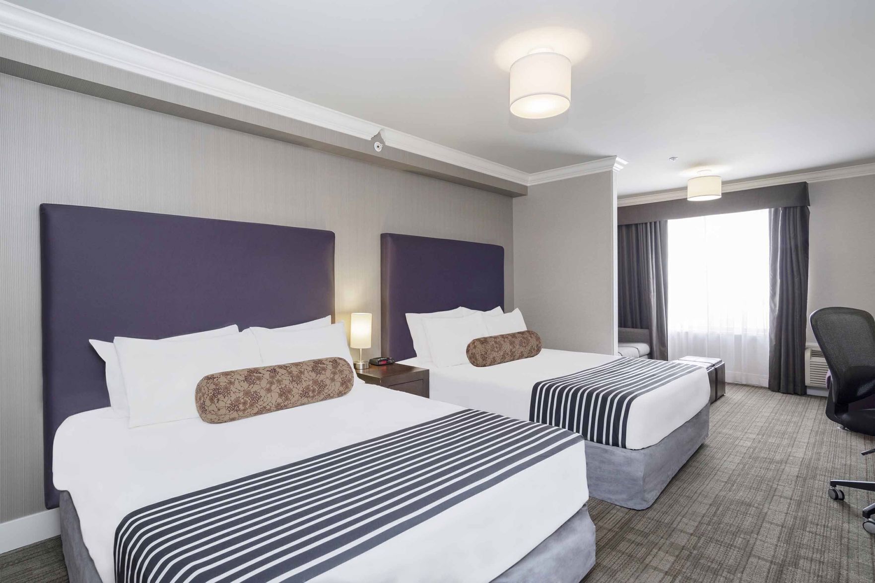 Premium bedding, pillowtop beds, in-room safe, desk