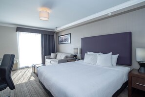 Premium bedding, pillow-top beds, in-room safe, desk - Sandman Hotel & Suites Calgary South (Calgary)