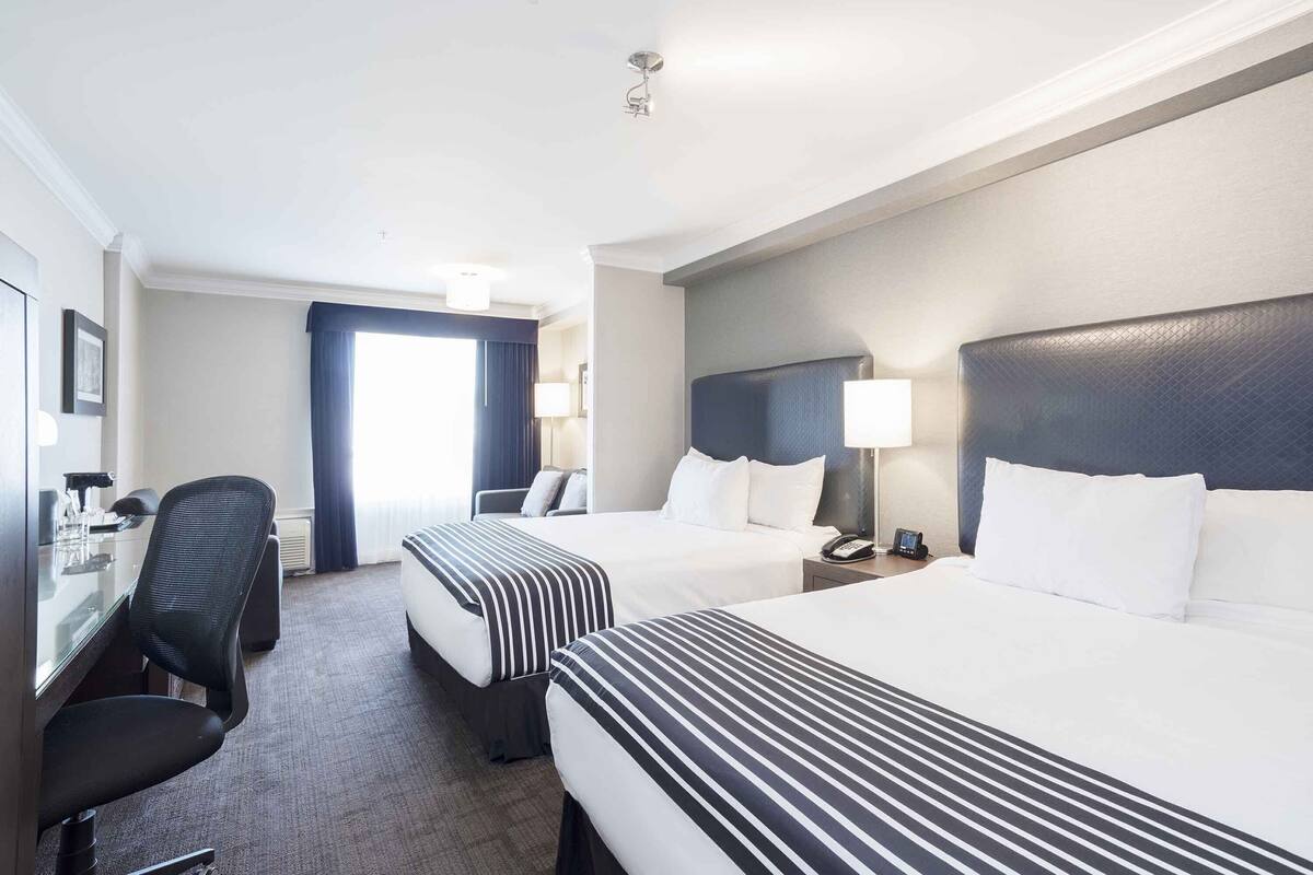 Premium bedding, pillow-top beds, in-room safe, desk