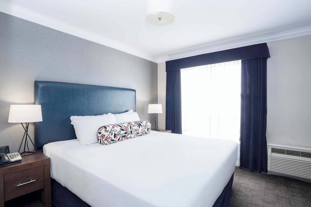 Premium bedding, pillow-top beds, in-room safe, desk