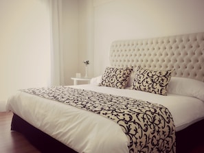 Ropa de cama de alta calidad y minibar