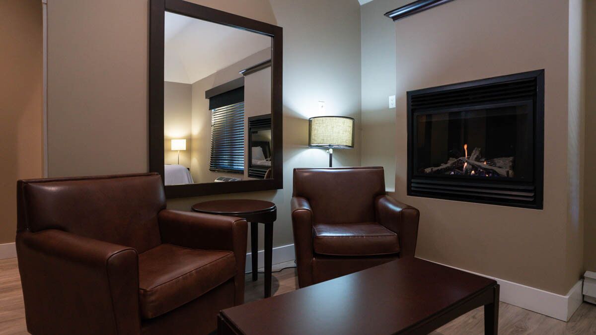 room, 1 king bed | living area | 55-inch tv with cable channels, ipod dock