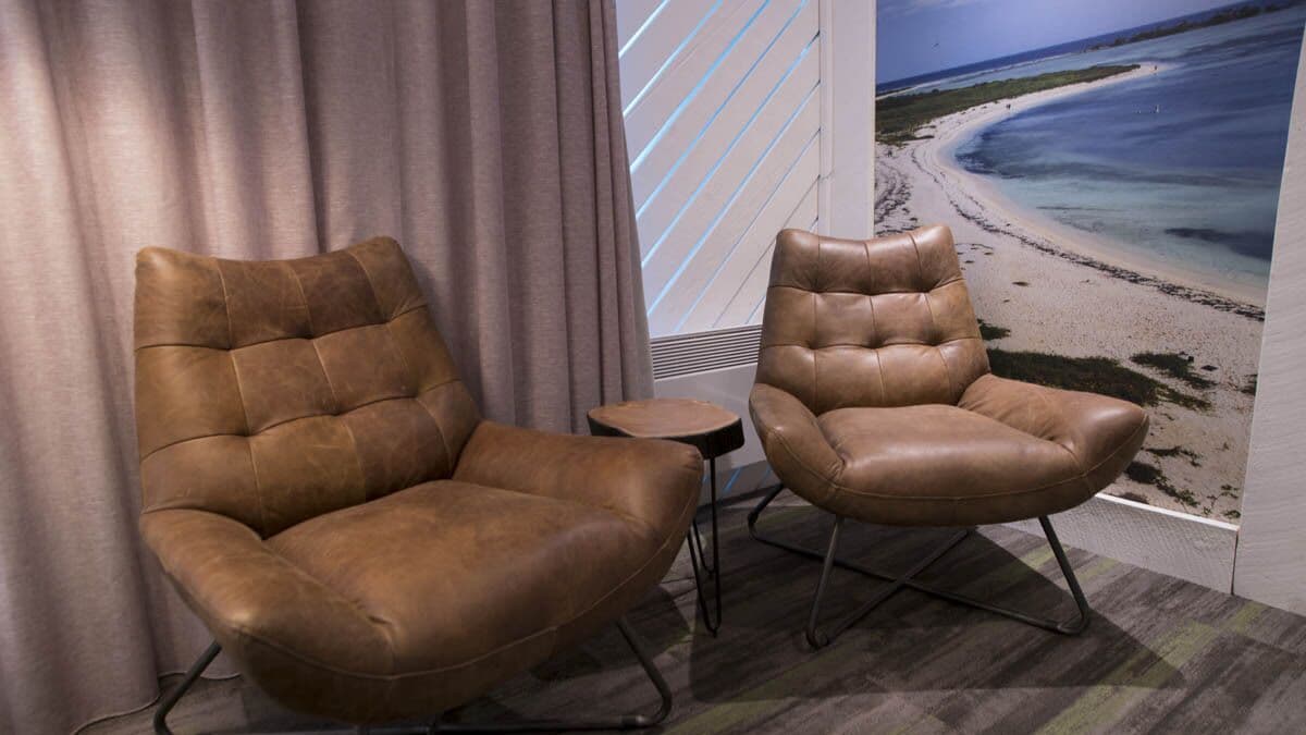 signature room | living area | 55-inch tv with cable channels, ipod dock