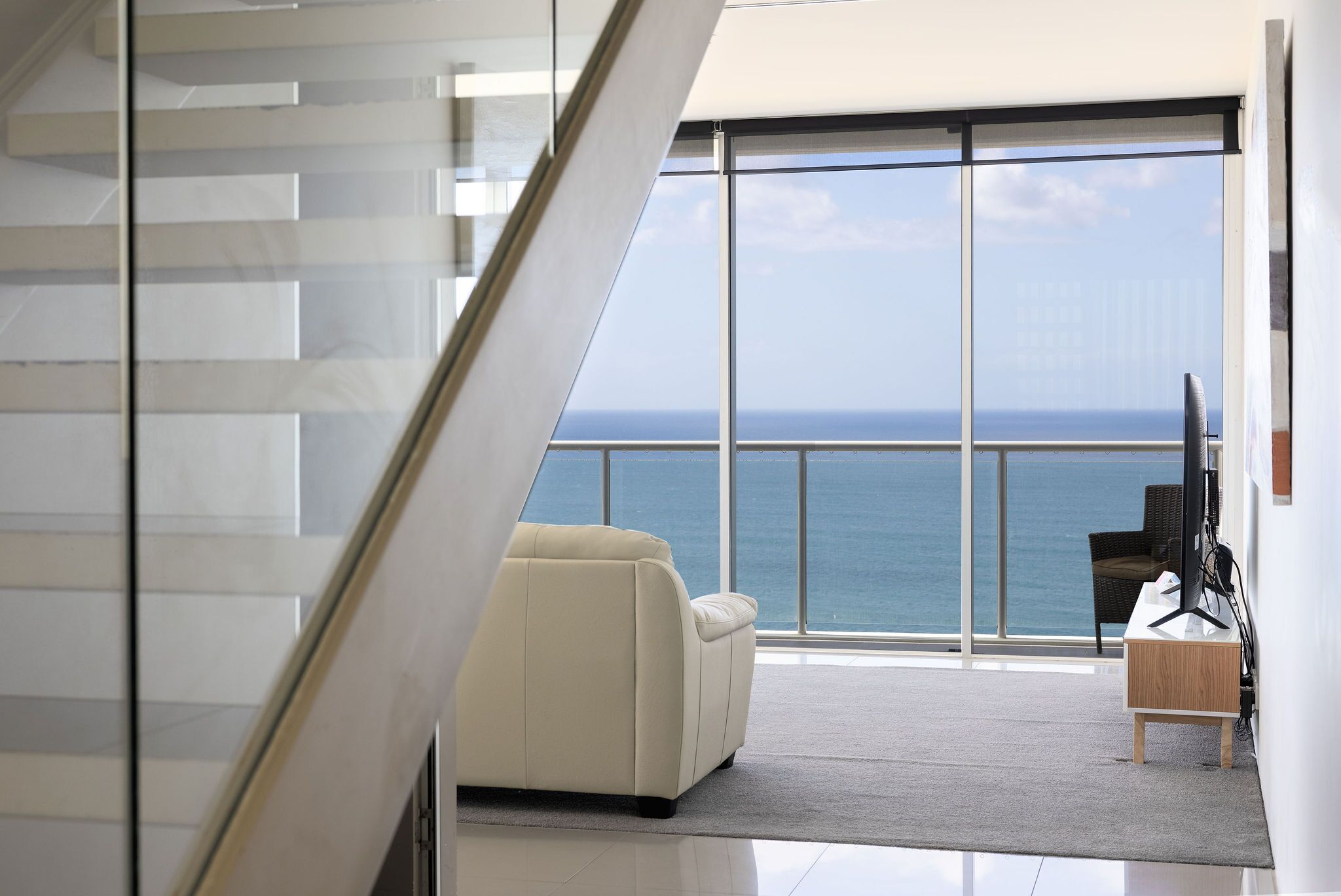 three bedroom suite with sea view | living area | 42-cm flat-screen tv with cable channels, tv, dvd player