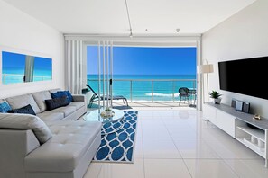 One Bedroom Ocean View Apartment | Living area | 42-cm flat-screen TV with cable channels, TV, DVD player