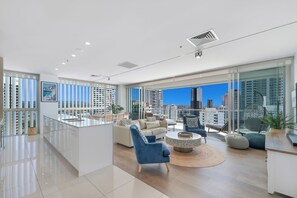 Two Bedroom Coastal View Suite | Living area | 42-cm flat-screen TV with cable channels, TV, DVD player
