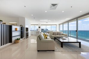 Three Bedroom Suite with Sea View | Living area | 42-cm flat-screen TV with cable channels, TV, DVD player