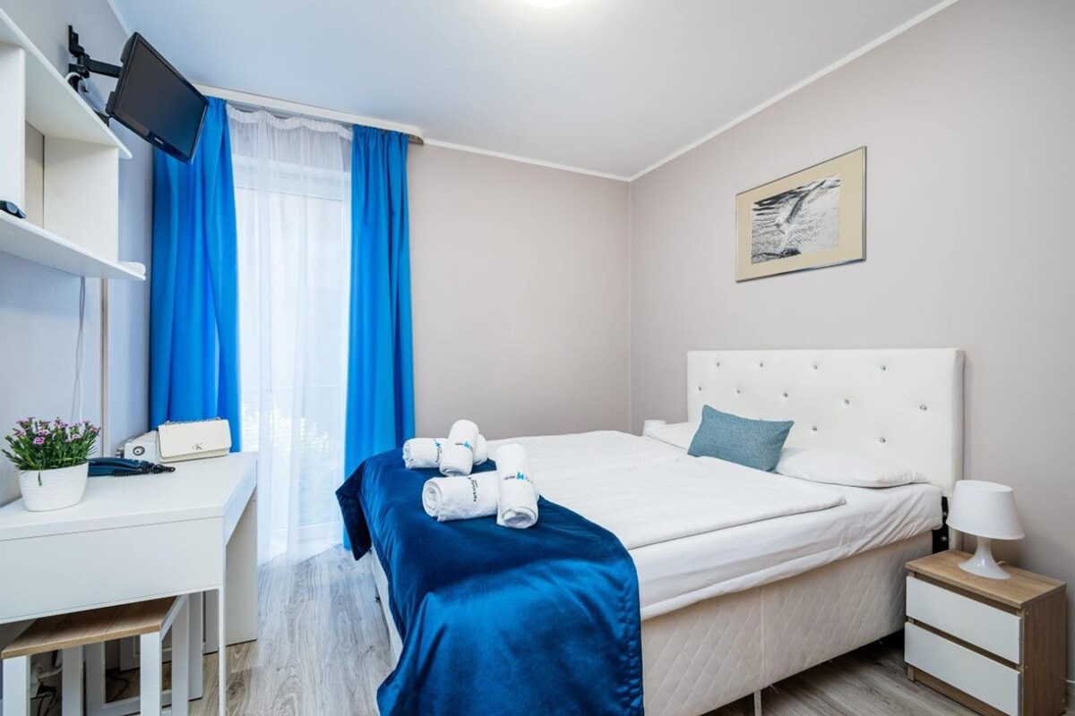 Down duvets, pillow-top beds, in-room safe, desk