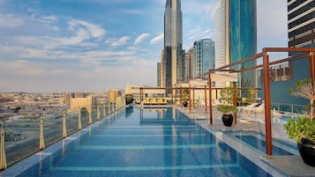 Outdoor pool, pool umbrellas, sun loungers