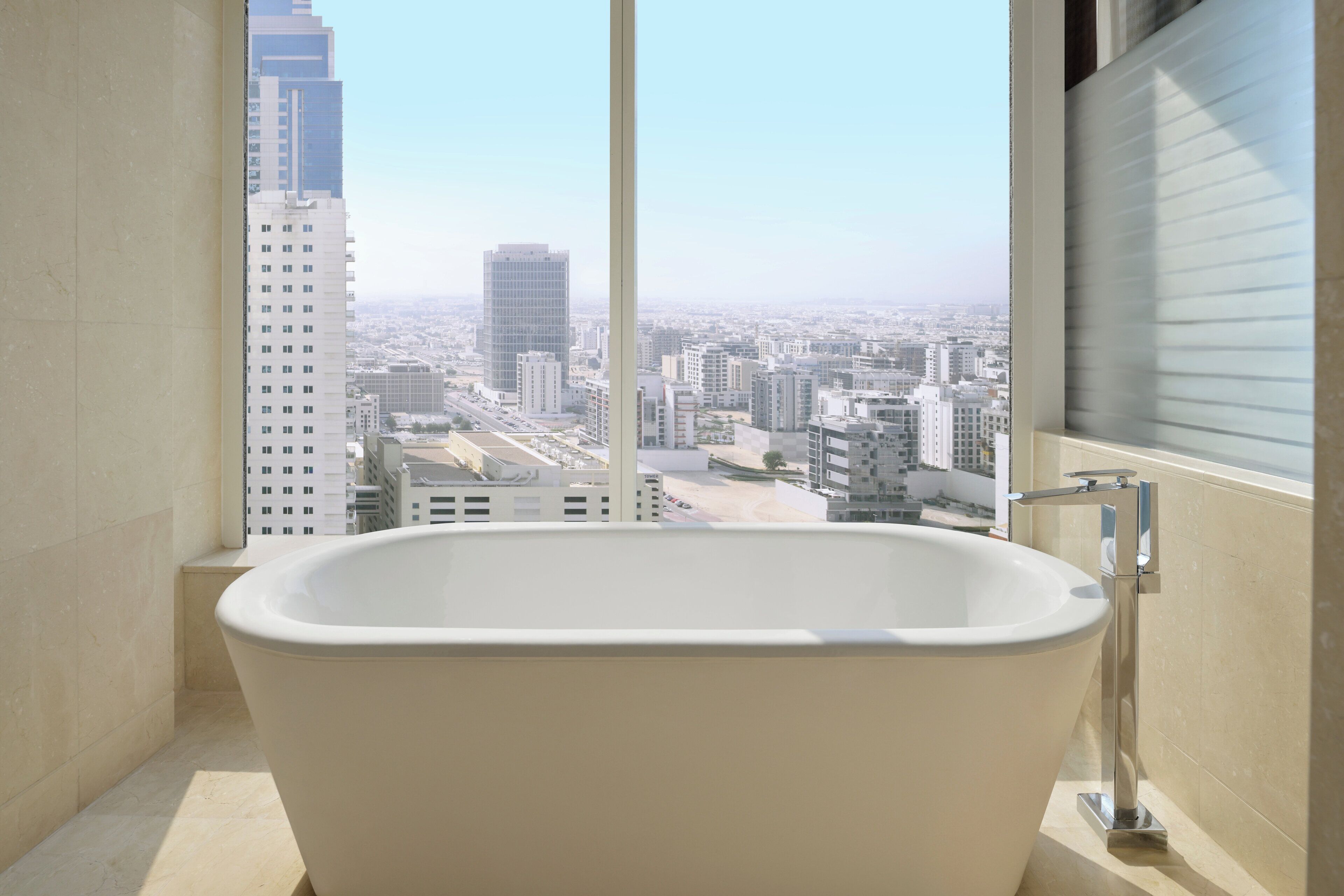 deluxe room, 1 king bed, city view (high floor) | bathroom | separate bathtub and shower, deep-soaking bathtub, rainfall showerhead