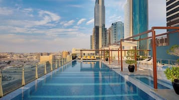 Outdoor pool, pool umbrellas, sun loungers