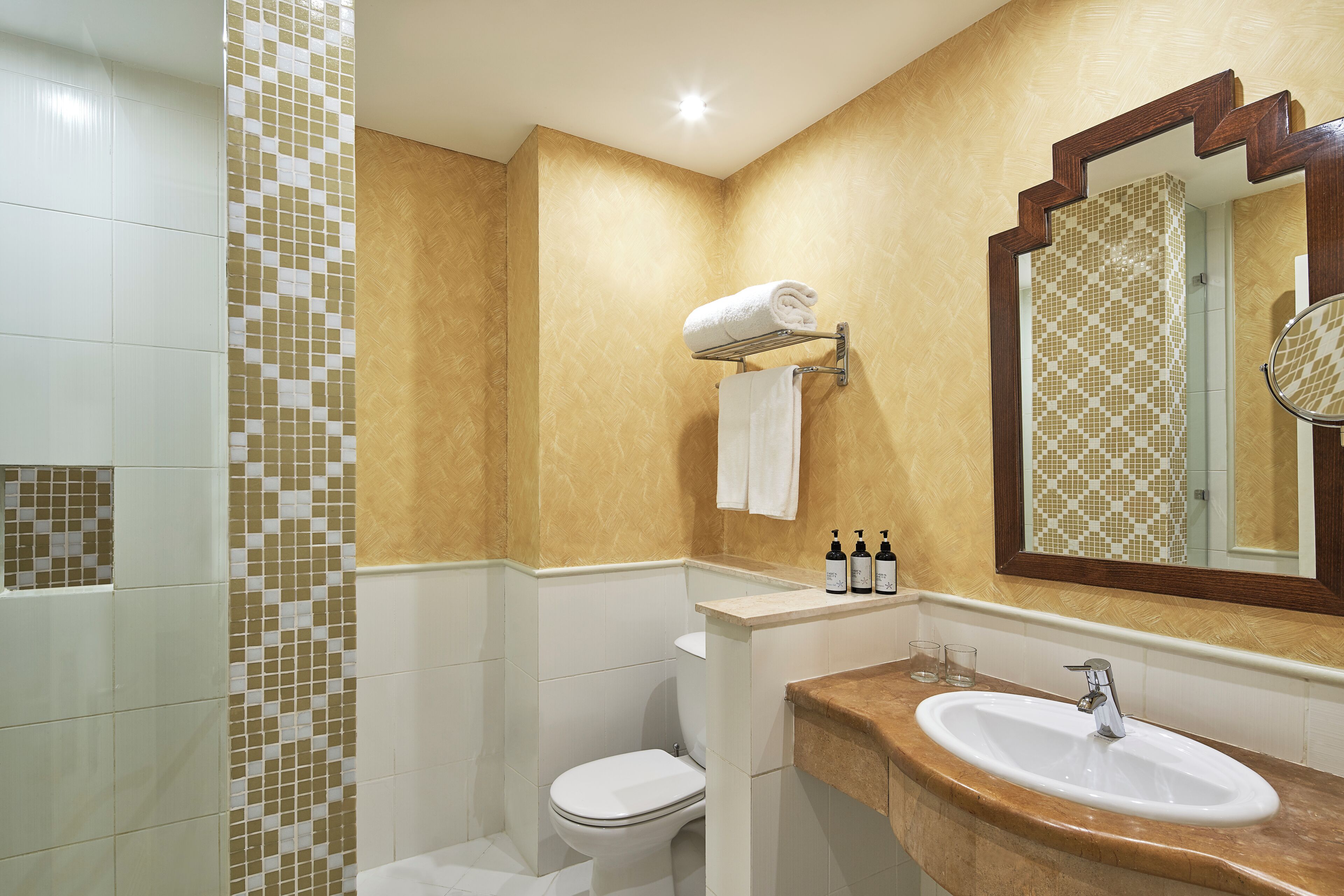 deluxe room | bathroom | eco-friendly toiletries, hair dryer, bidet, towels