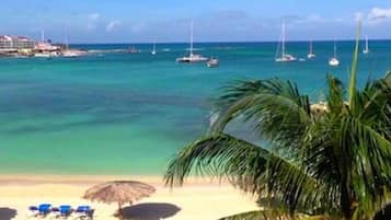 Beach nearby, white sand, sun loungers, beach umbrellas