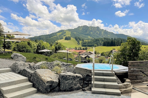 Bañera de hidromasaje al aire libre
