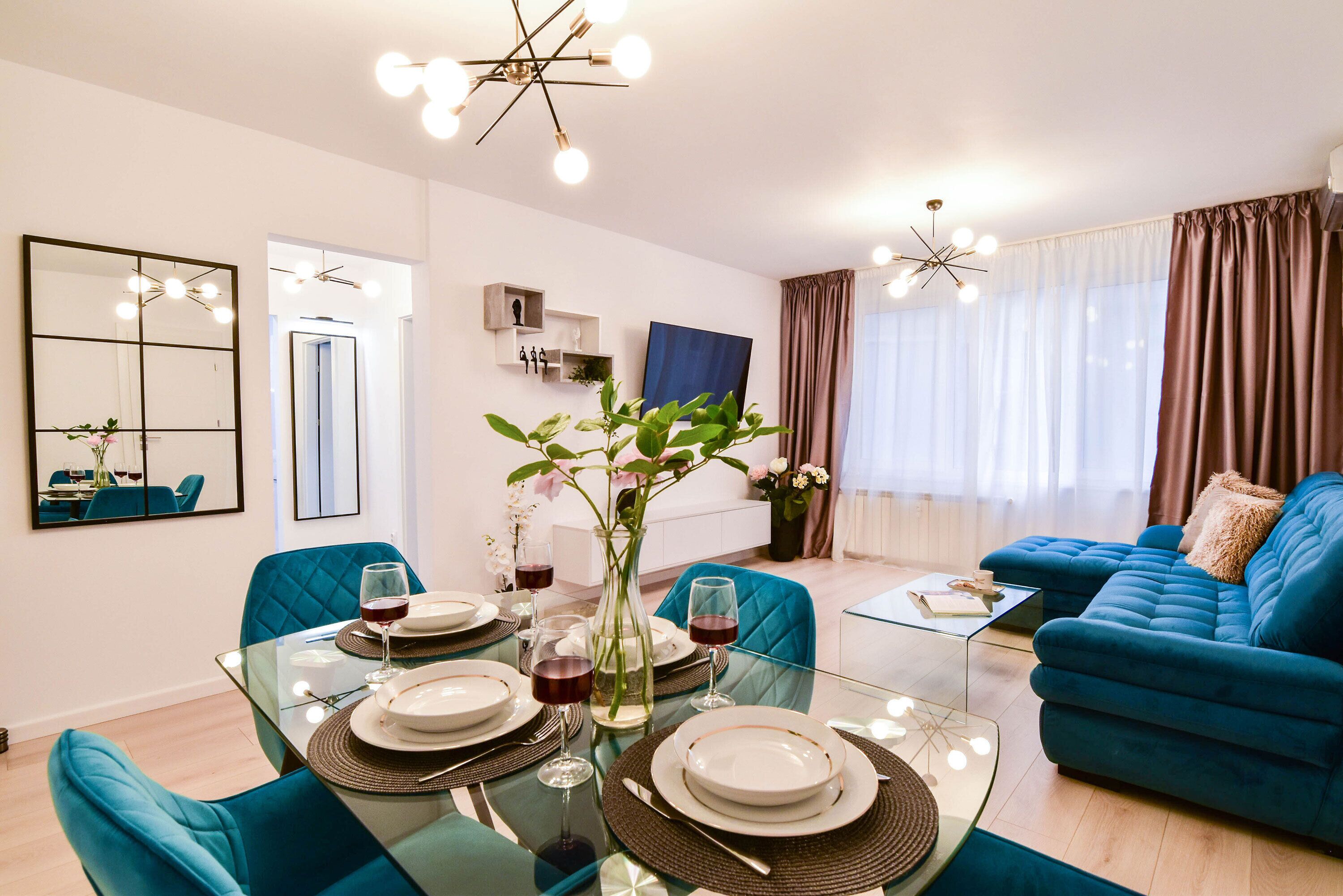 Luxury Apartment | Living area | 140-cm LED TV with digital channels