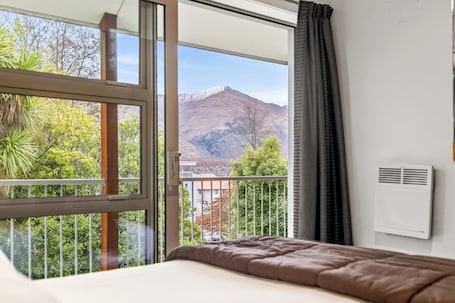 Family 1 Bedroom Apartment | Pillowtop beds, blackout drapes, soundproofing, iron/ironing board