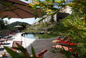 Outdoor pool, pool umbrellas, pool loungers