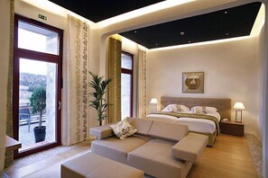 Premium bedding, pillow-top beds, minibar, in-room safe