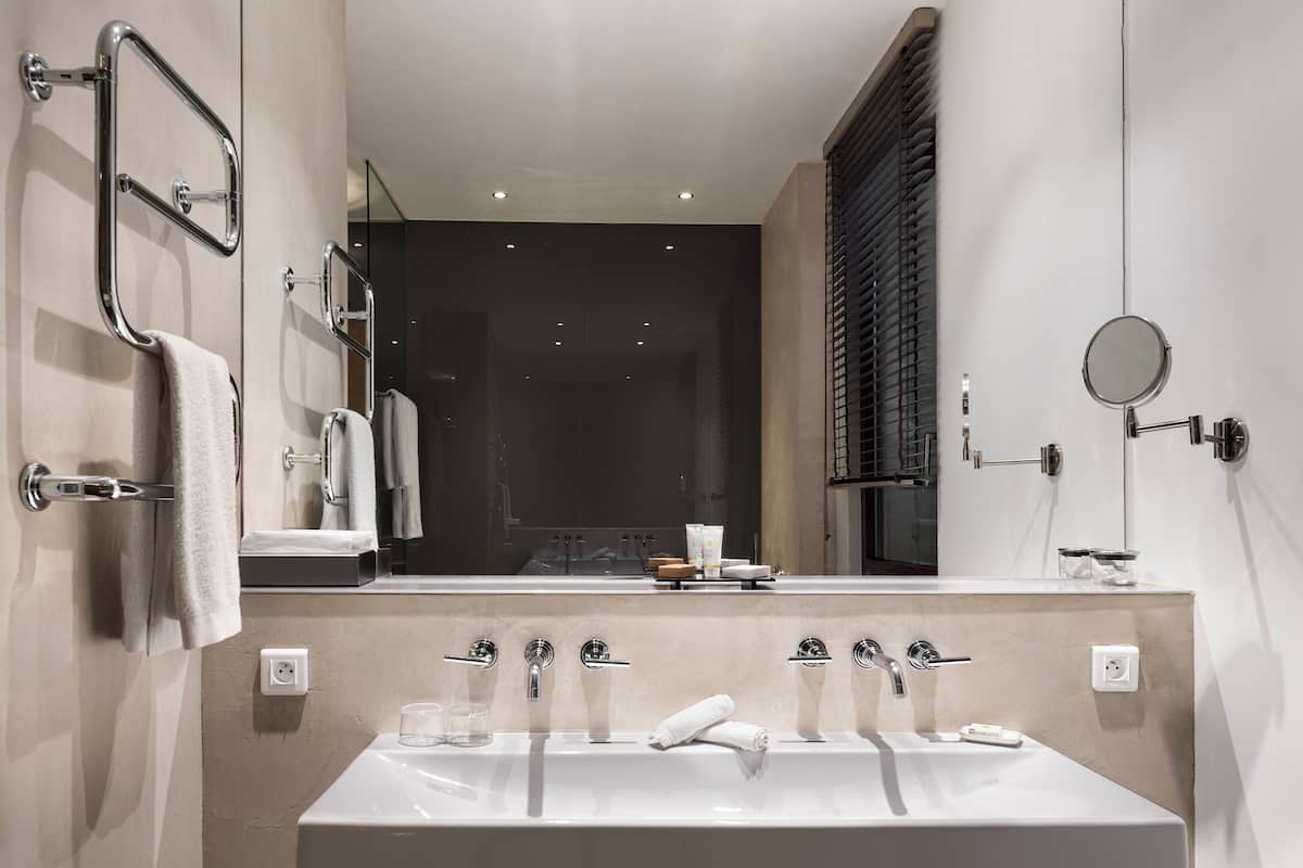 hair dryer, bathrobes, slippers, towels