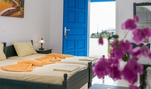 Select Comfort beds, blackout curtains, iron/ironing board - Firoa Studios (Naxos)
