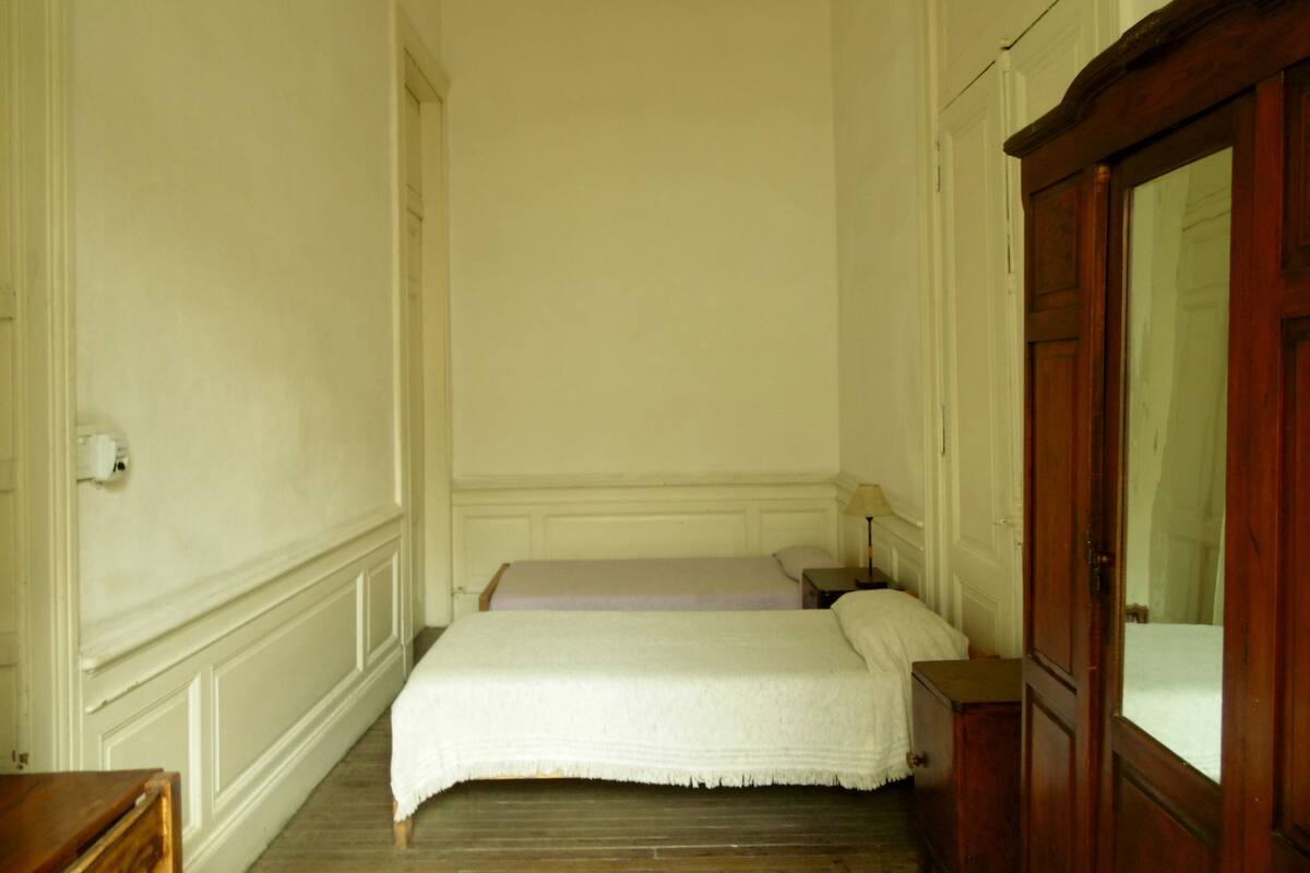 Double Room, Shared Bathroom | 4 bedrooms, in-room safe, desk, iron/ironing board