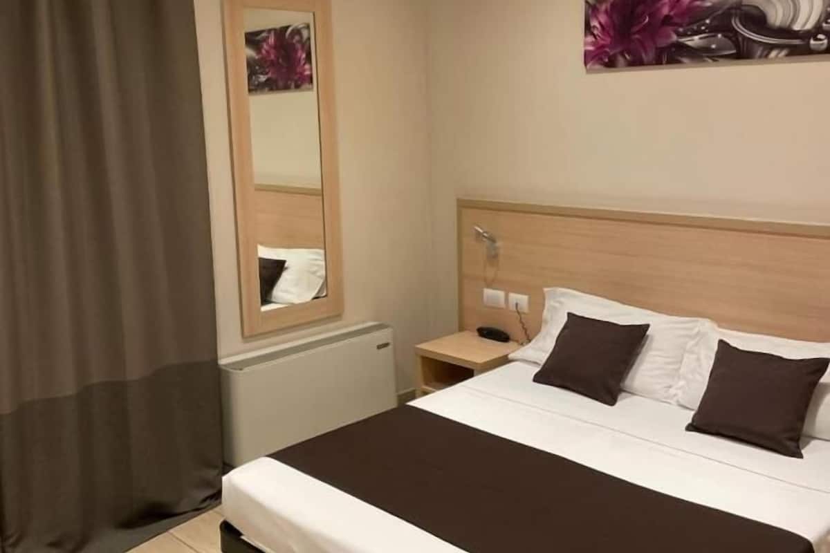 Habitación con 1 cama matrimonial o 2 individuales | Sábanas italianas Frette y ropa de cama de alta calidad