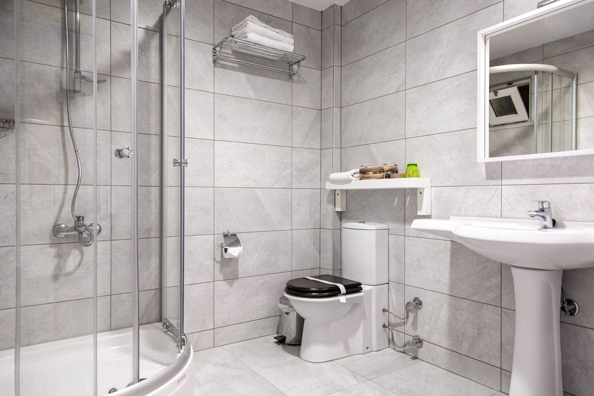 standard single room | premium bedding, laptop workspace, blackout curtains, soundproofing