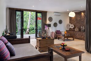 2 Bedroom Kelapa Residence | Living area | Fireplace