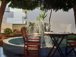 Outdoor pool, open 8:30 AM to 7:30 PM, pool umbrellas, pool loungers