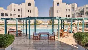 Outdoor pool, pool umbrellas, pool loungers