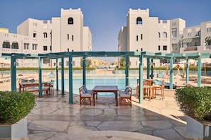 Outdoor pool, pool umbrellas, pool loungers