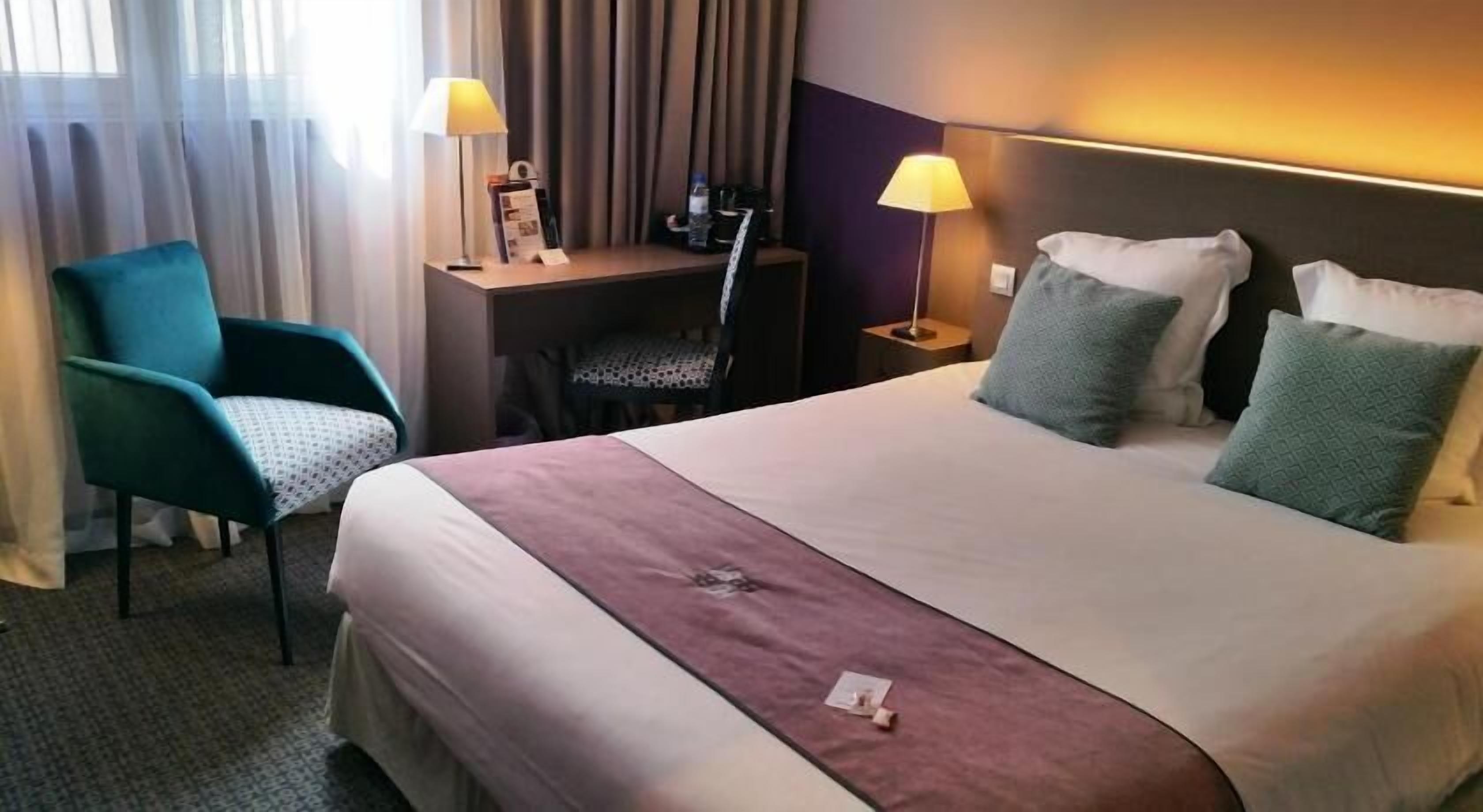 Premium bedding, pillow-top beds, in-room safe, desk