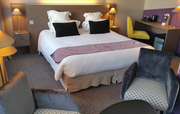 Premium bedding, pillow-top beds, in-room safe, desk