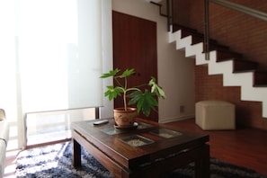 Executive Loft (Apartment) | Living room | 29-inch LCD TV with cable channels, TV