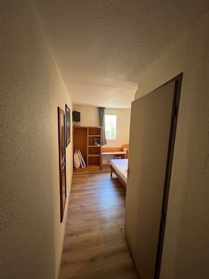 Economy Room | Memory-foam beds, individually furnished, desk, iron/ironing board