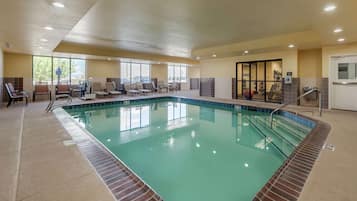 Indoor pool, open 7 AM to 10 PM, pool loungers