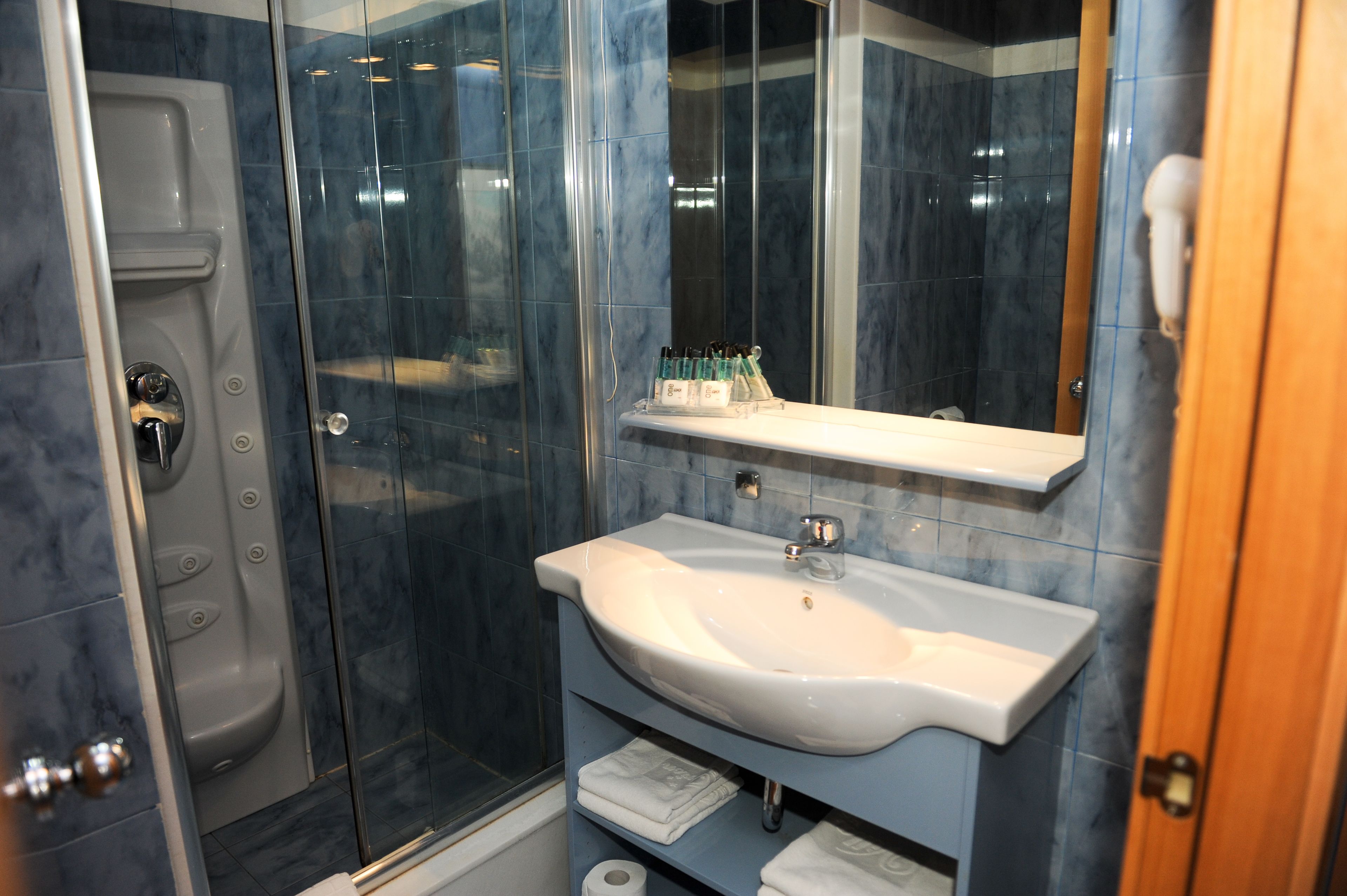 free toiletries, hair dryer, dressing gowns, slippers