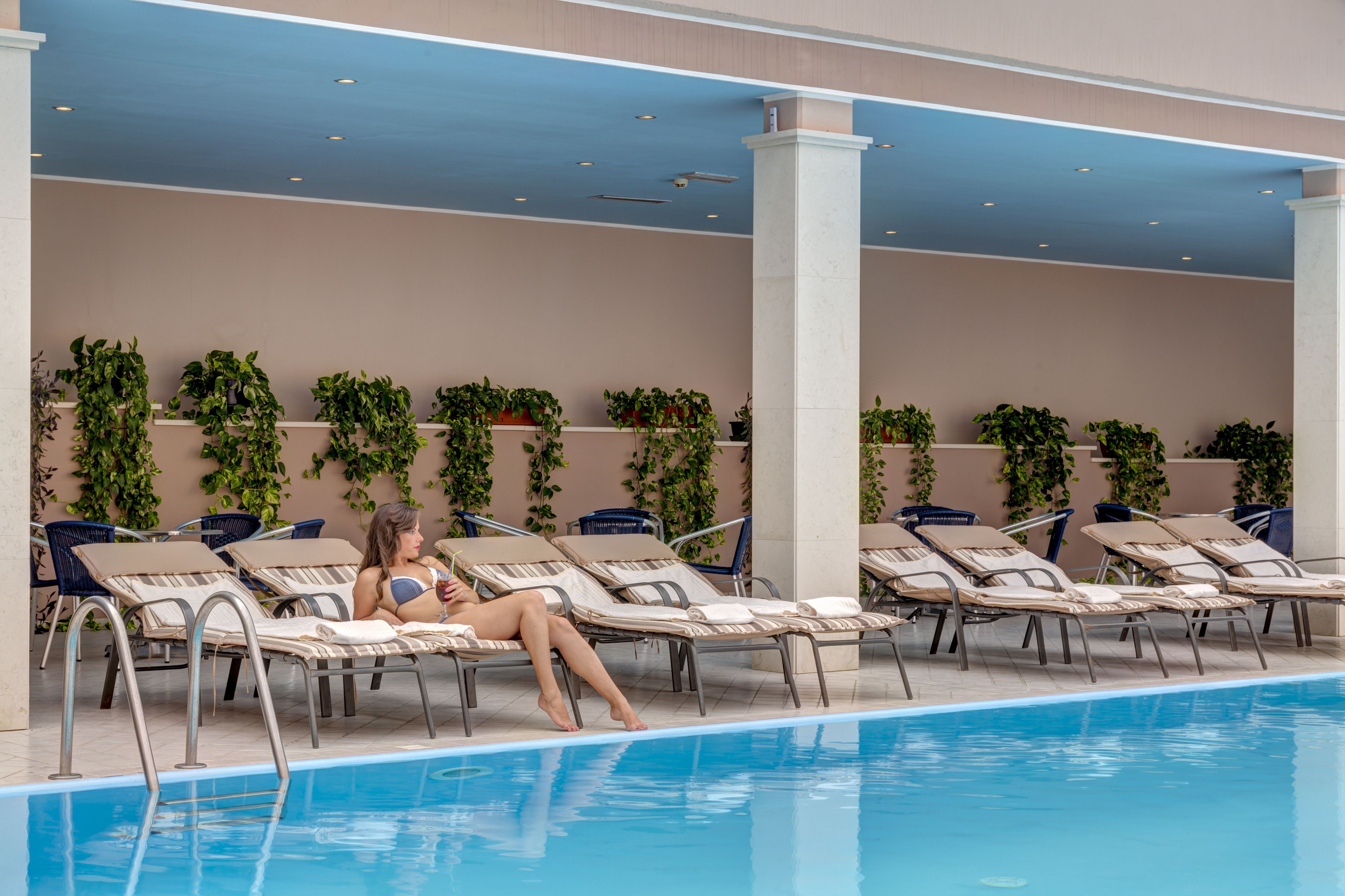 indoor pool, open 7:30 am to 6:30 pm, pool loungers