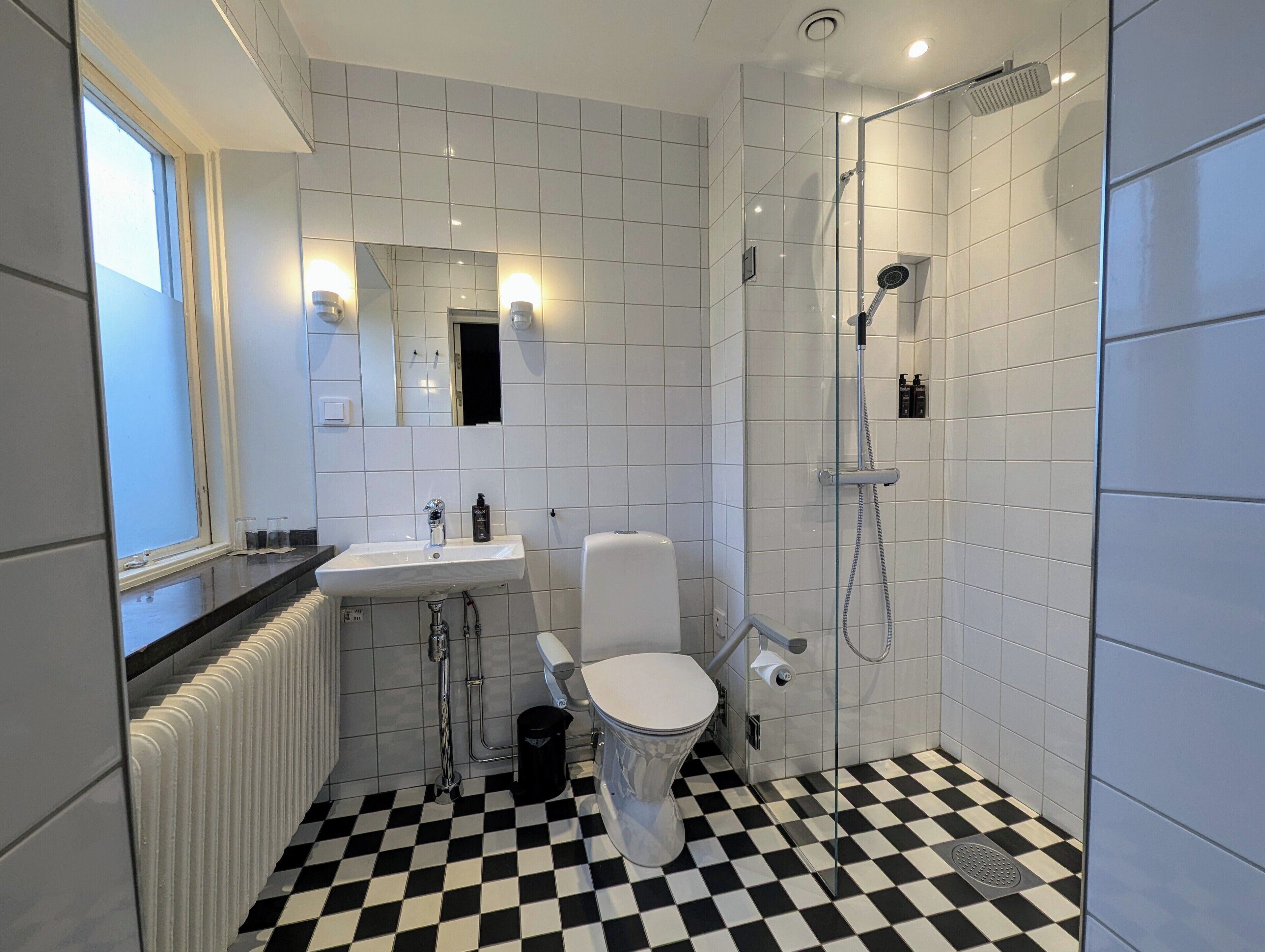 family room | bathroom | shower, free toiletries, hair dryer, towels